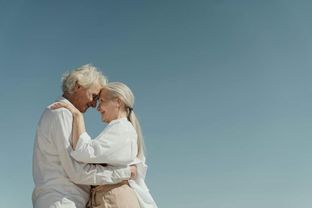 A man and woman facing each other