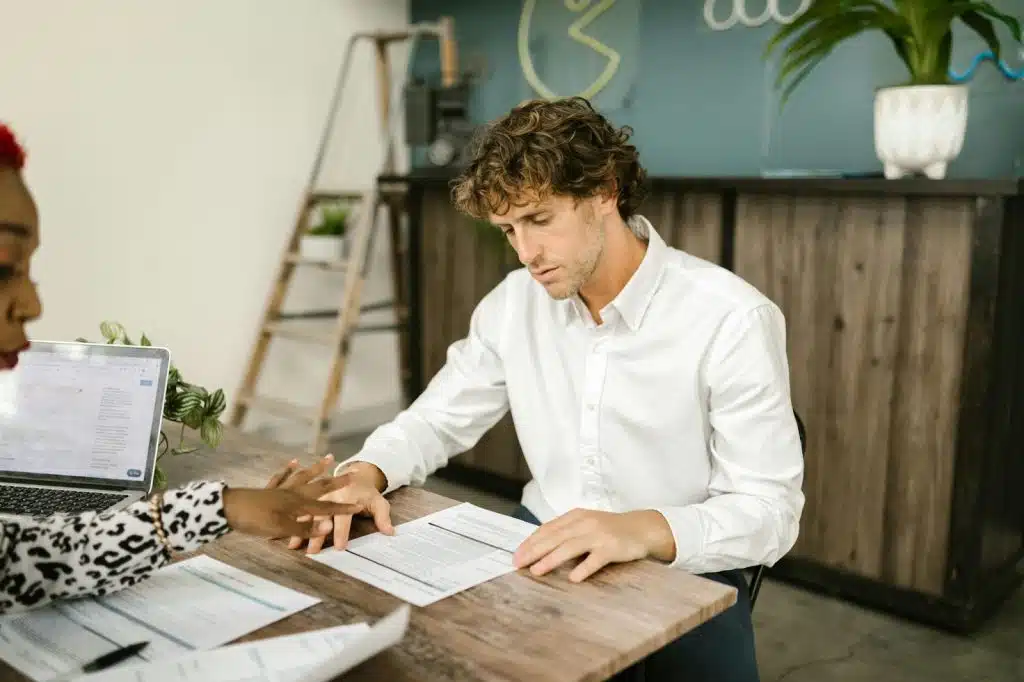 A man looking on a document