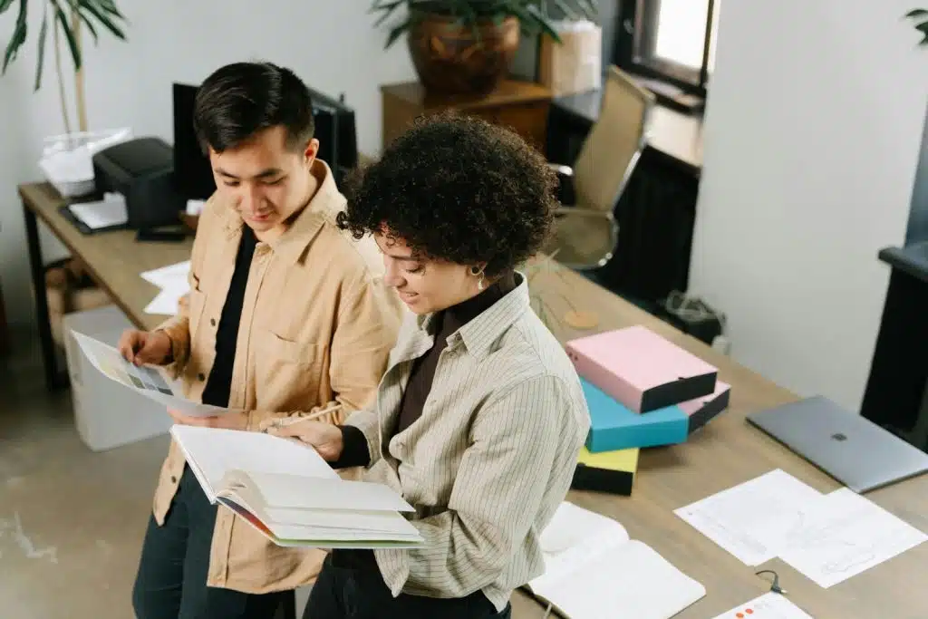 A man and woman talking about work
