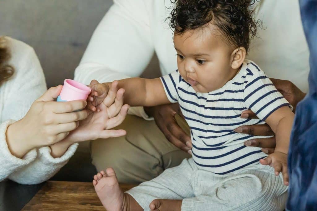 Parents playing with their kid