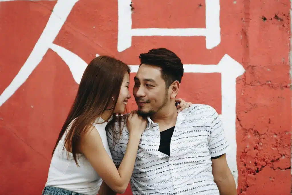 The couple is spending time together outdoors.