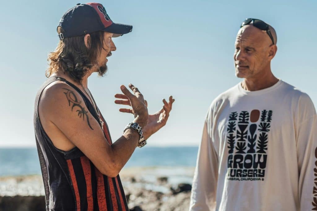 A man explaining something to his friend