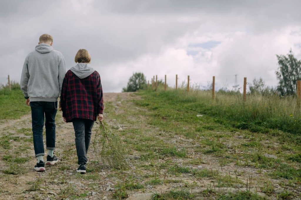 A man and woman walking