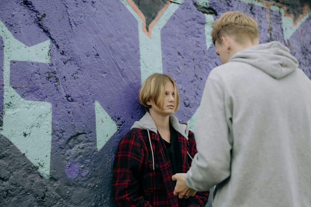 A woman realizing something while looking at the man