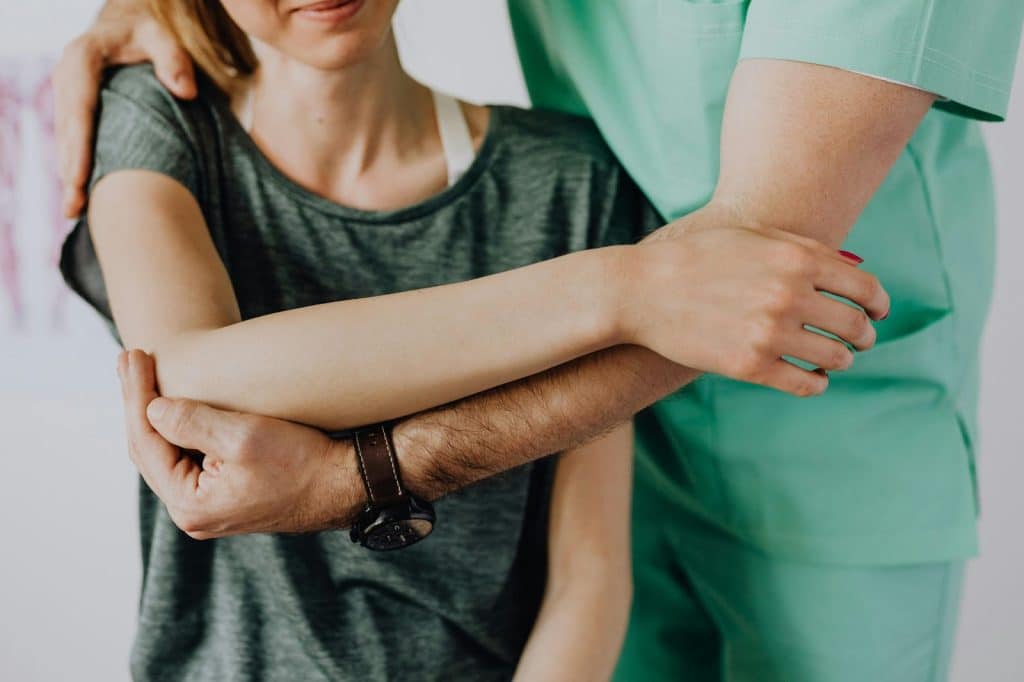 A man and woman hugging each other