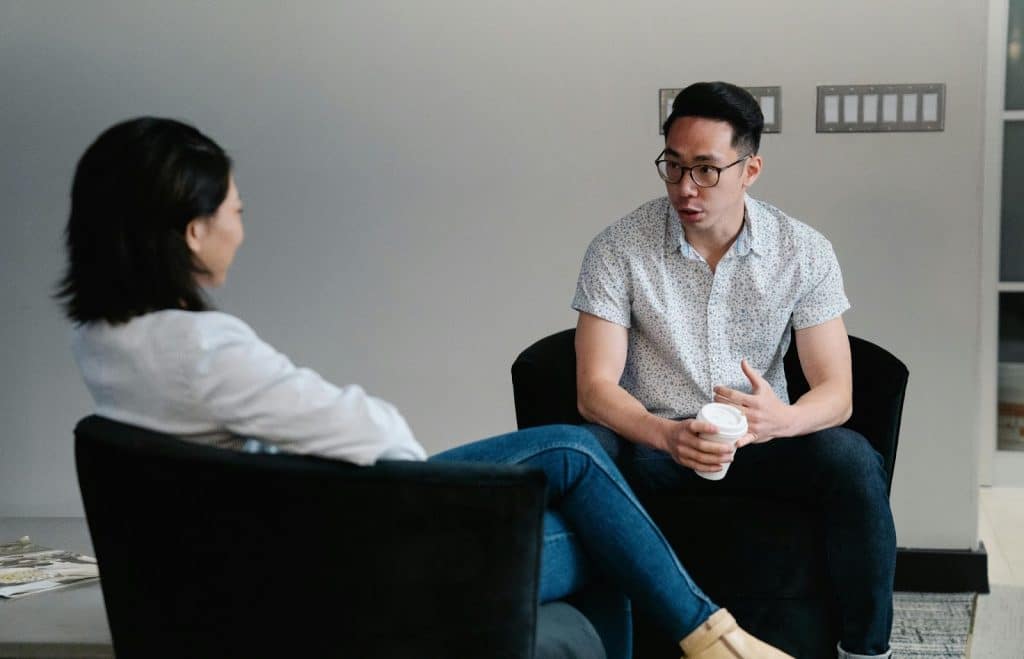A man and woman talking