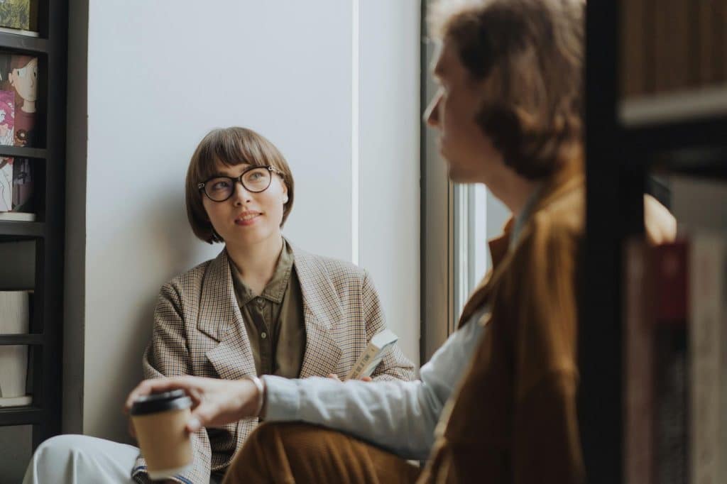 A man and woman having a serious conversation