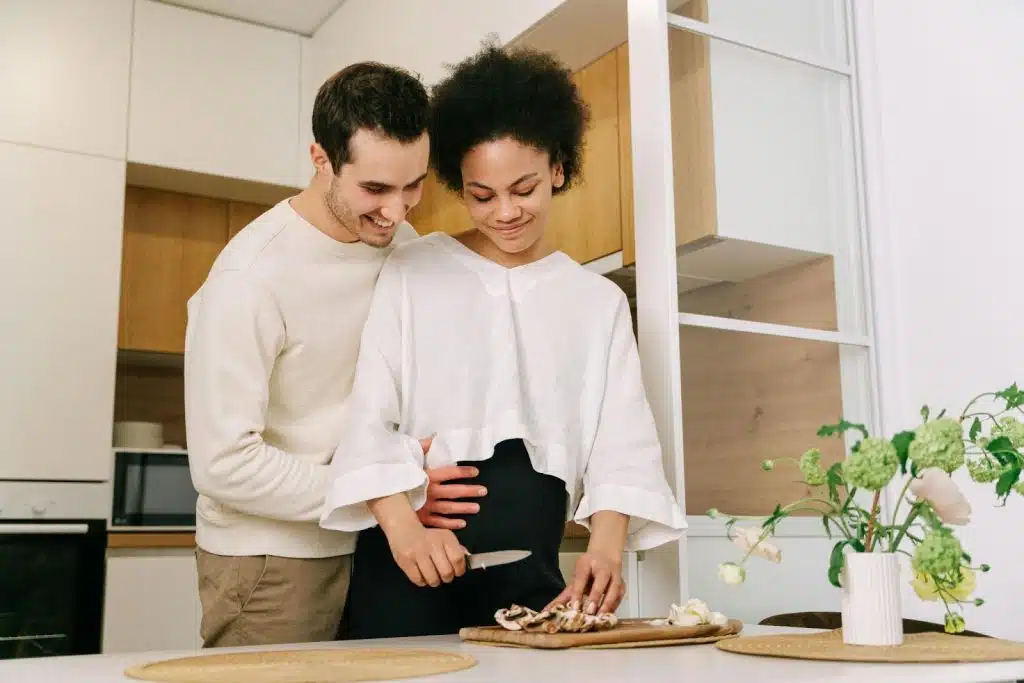 A man assisting a woman