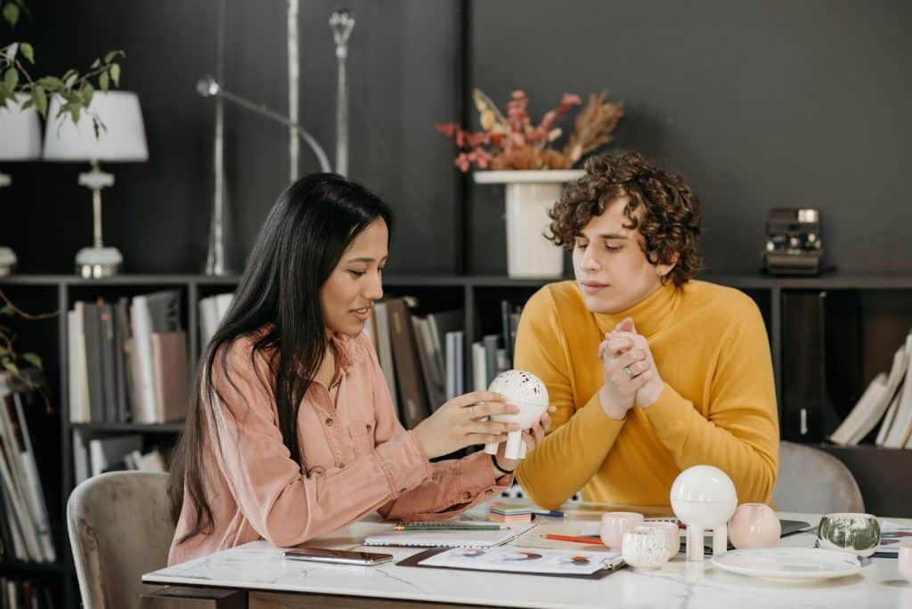 A man observing a woman