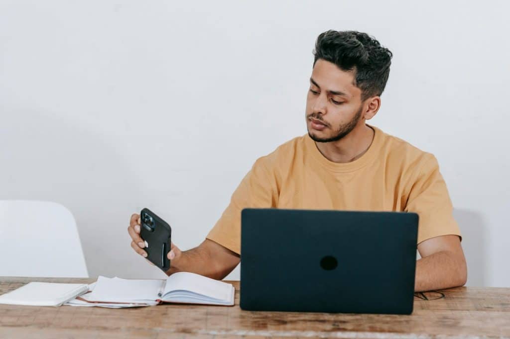 A man checking a phone