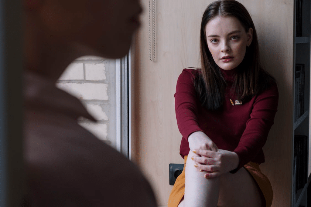 A Female Wearing Red Long Sleeves