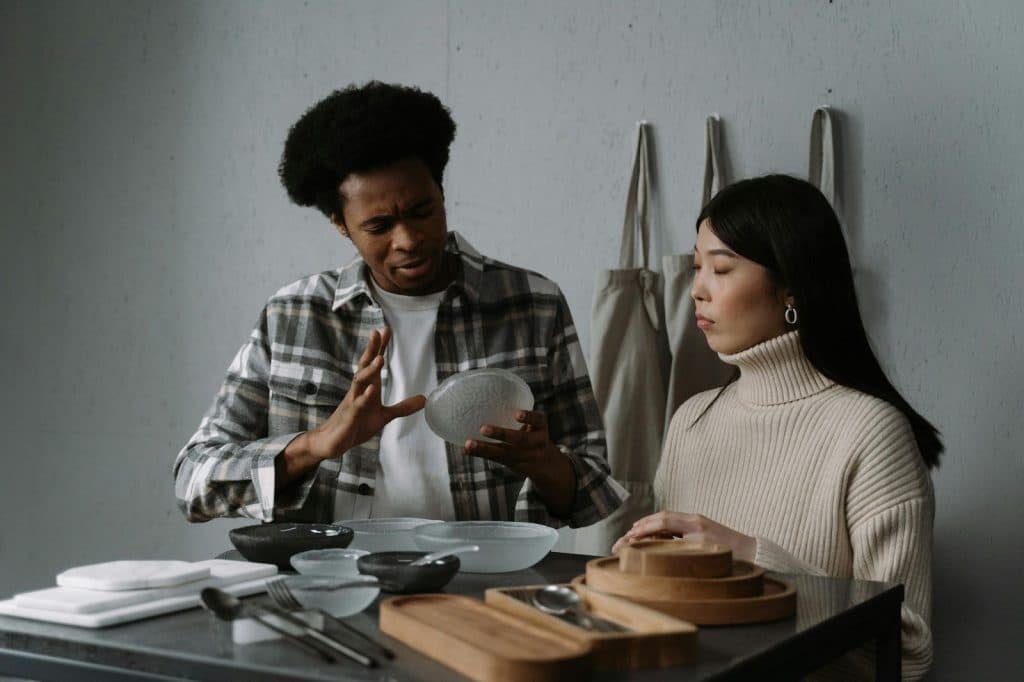 A man talking to a woman