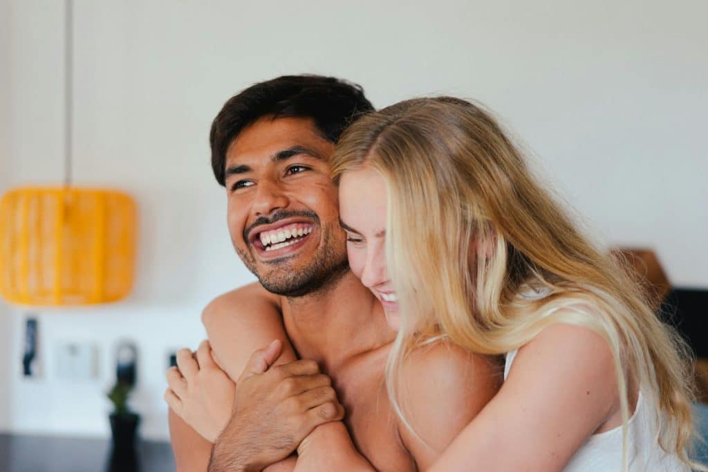 A couple laughing together