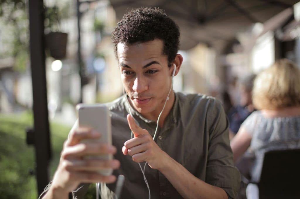 A man talking to someone in videocall