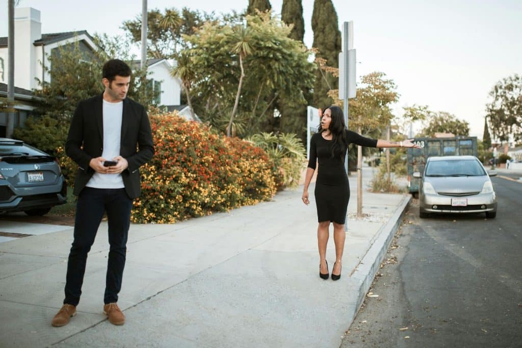 A woman shouting at the man