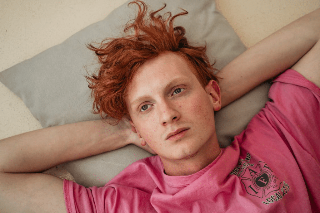 Man Wearing Pink Crew Neck Shirt