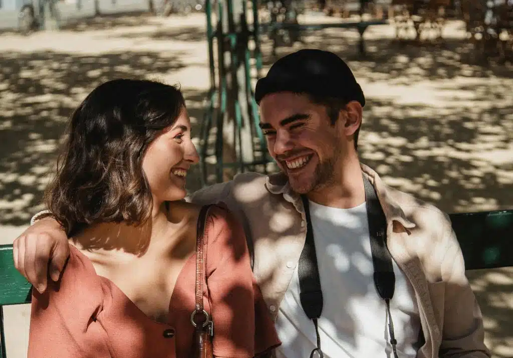 A man and woman laughing