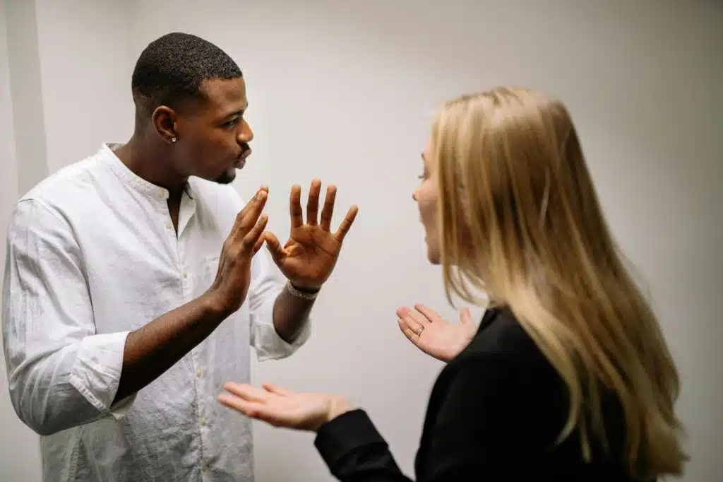 A man and woman fighting