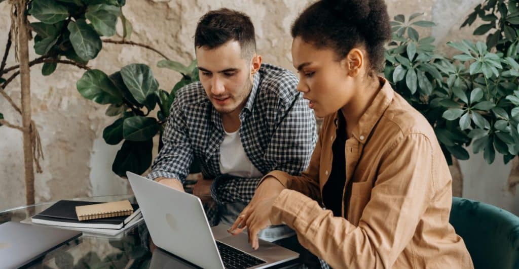 A man and woman working together 
