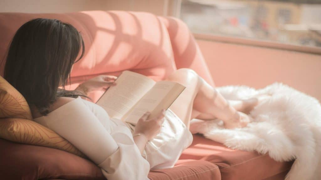 A woman reading by herself.
