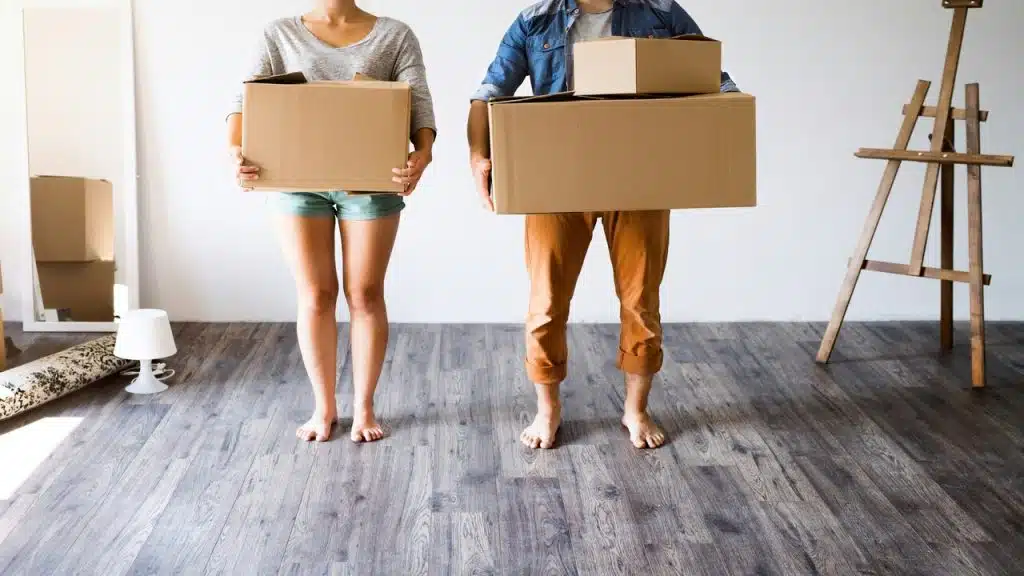 A couple moving into a new house.