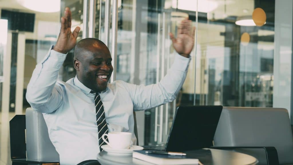 A man celebrating for a win.