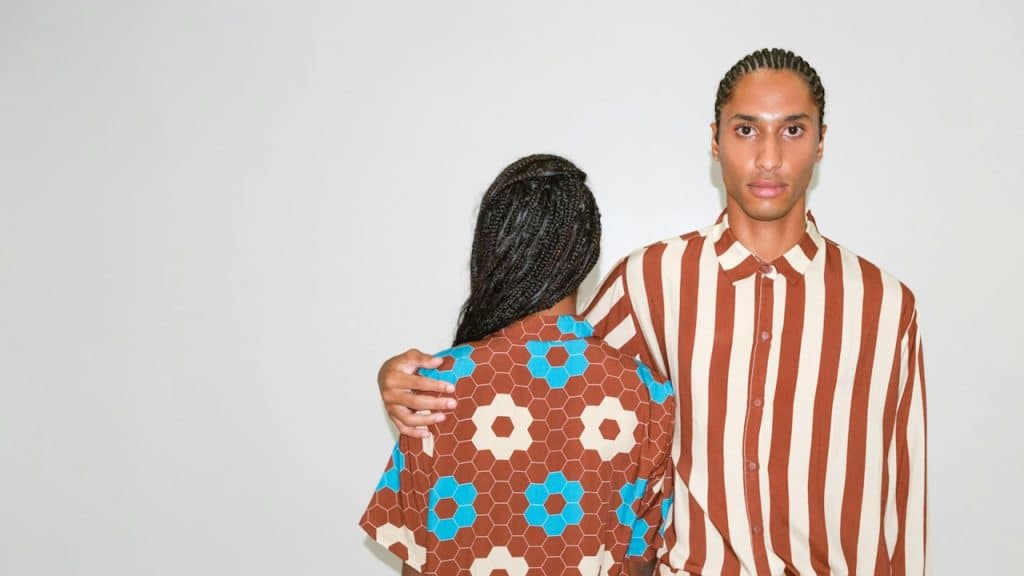 A man and a woman standing next to each other.
