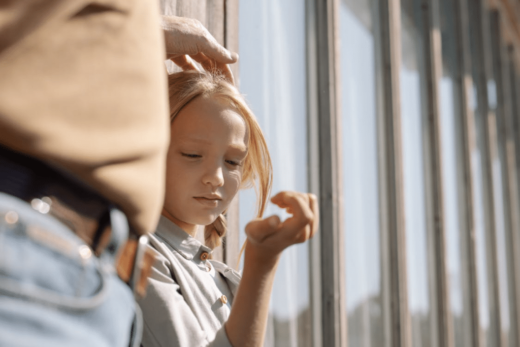A Close-Up Shot of a Girl Looking at Her Wrist