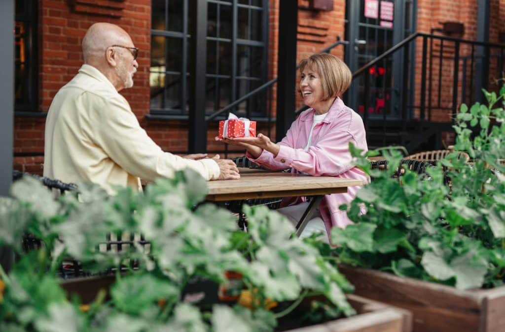 A husband giving his wife a gift