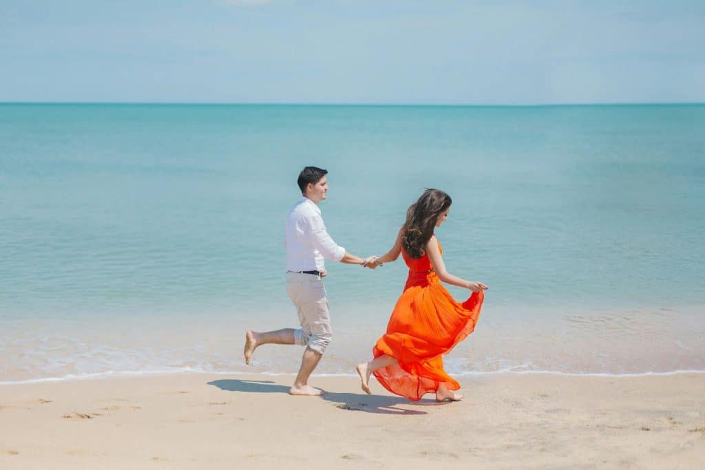 A man and woman at the beach
