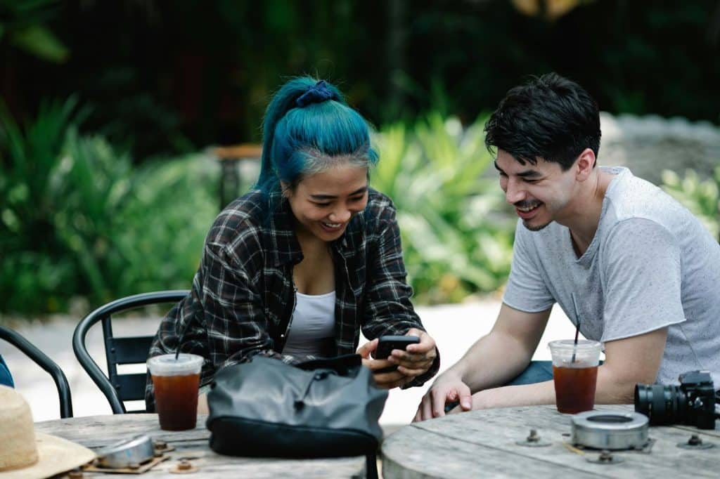 A man and woman having a fun moment