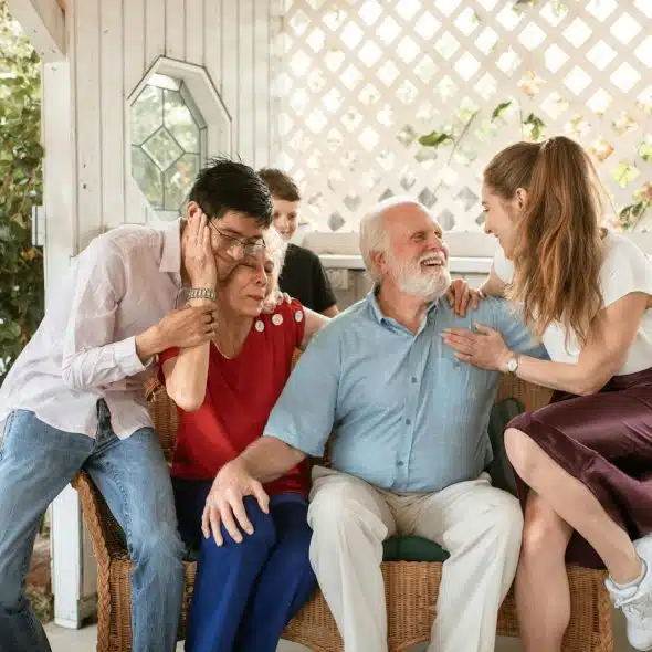 A picture of an old couple with a new couple