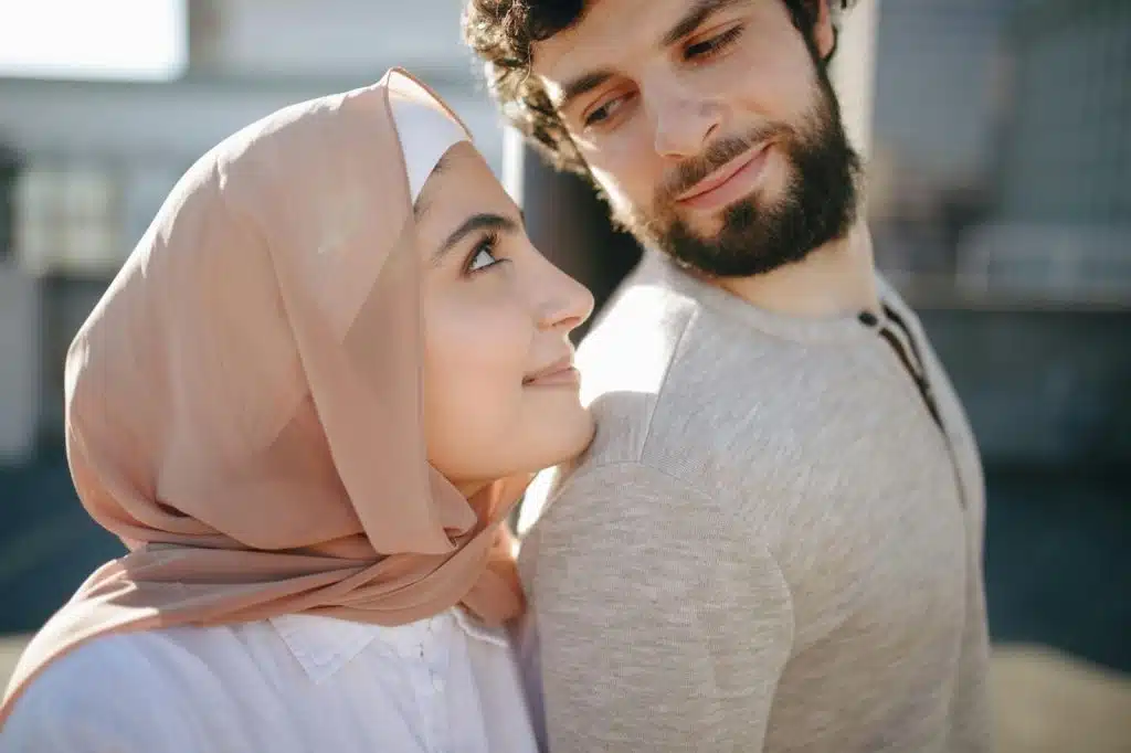 A man looking back to a woman