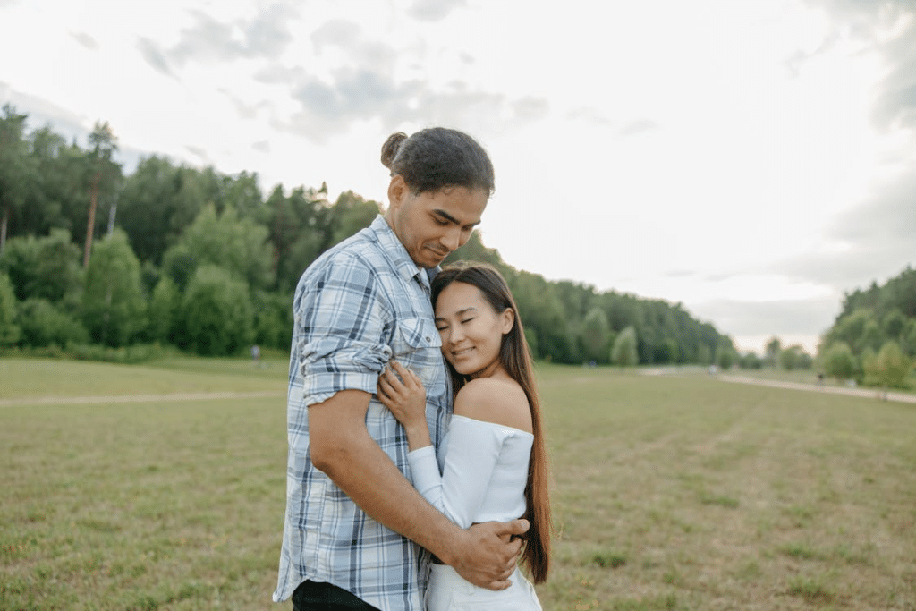 A Woman Resting Her Head on a Man's Chest
