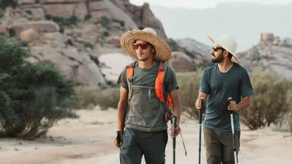 Two men trekking through the wild.