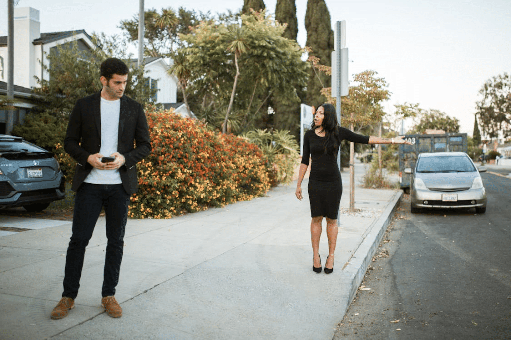 A Couple Standing on the Street