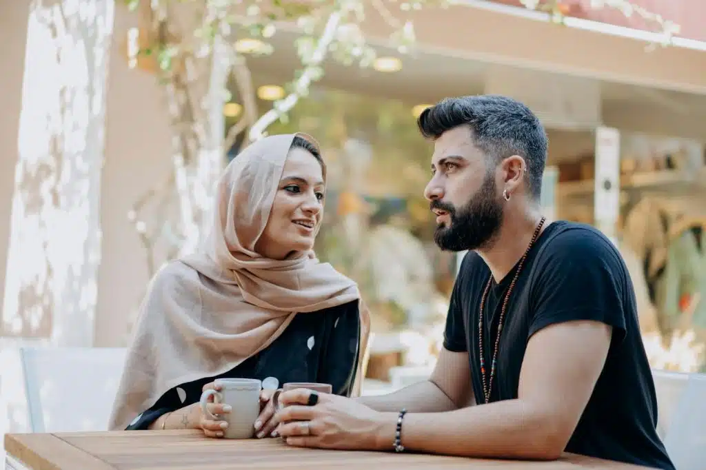 A man and woman talking