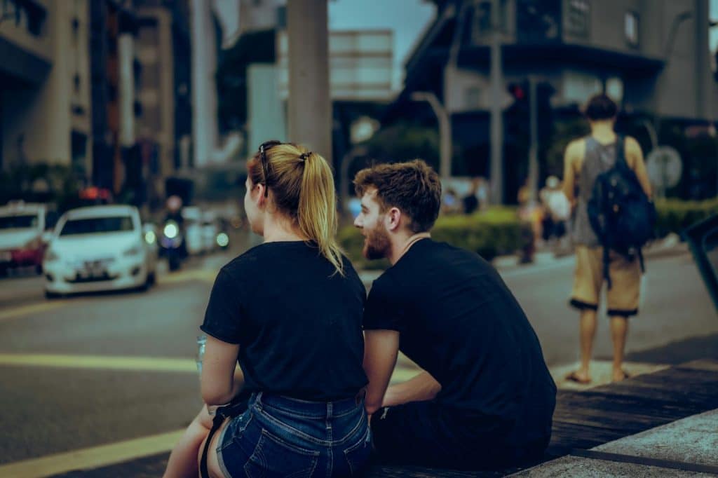 A man and woman sitting and talking