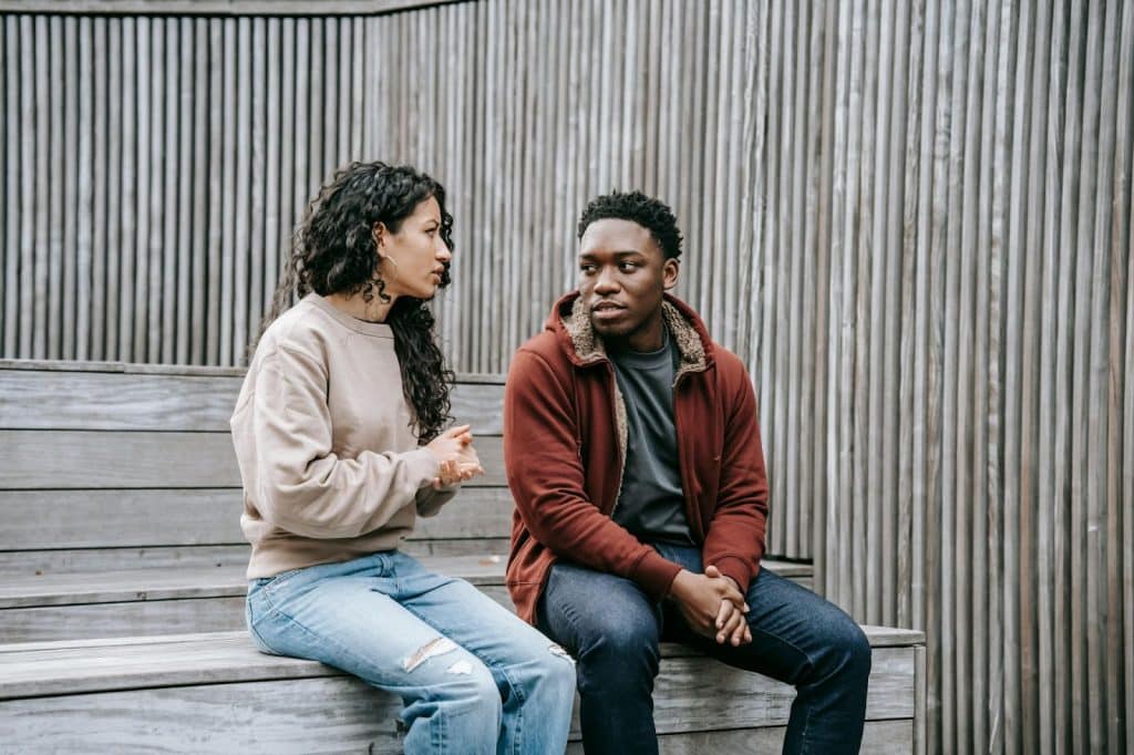 A man and woman having a conversation
