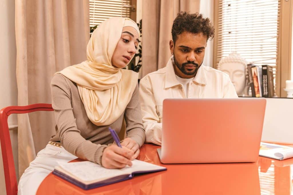 A man and woman busy
