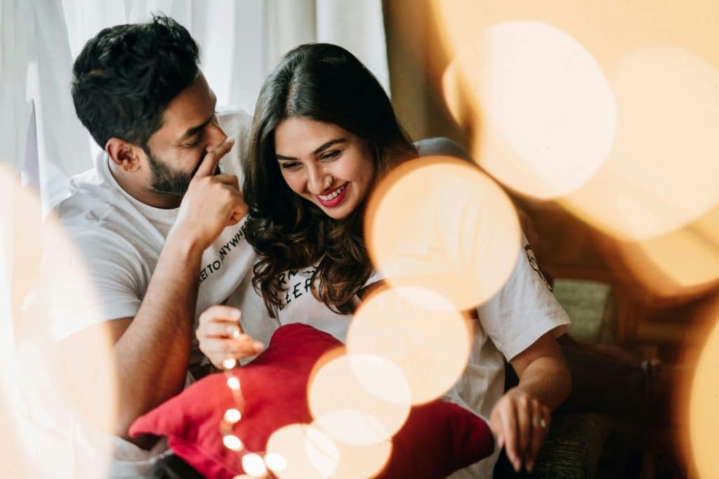 A man making a woman happy