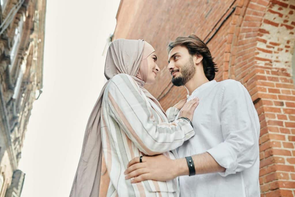 A man and woman looking at each other