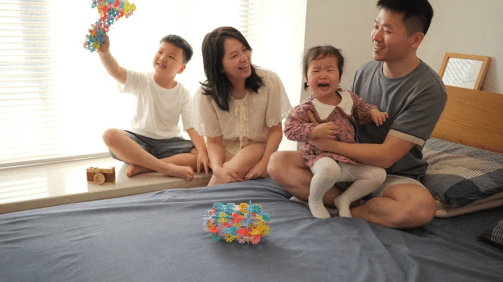 Husband calmly helping with kids at home