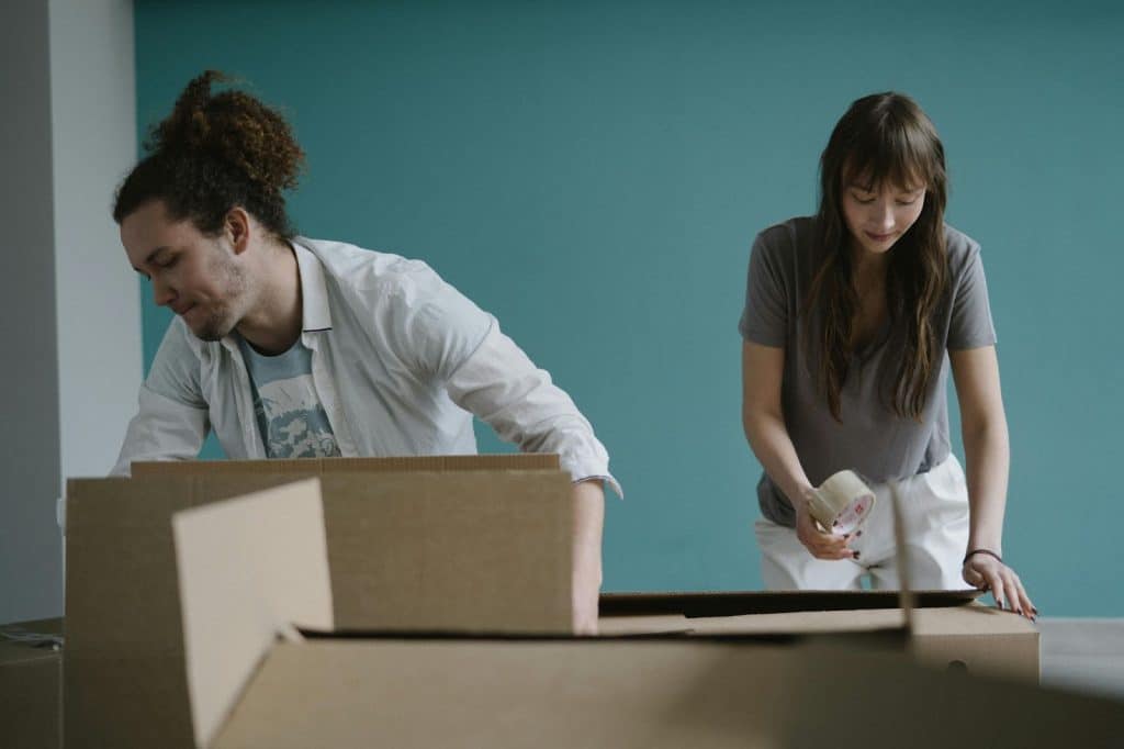 A man helping a woman