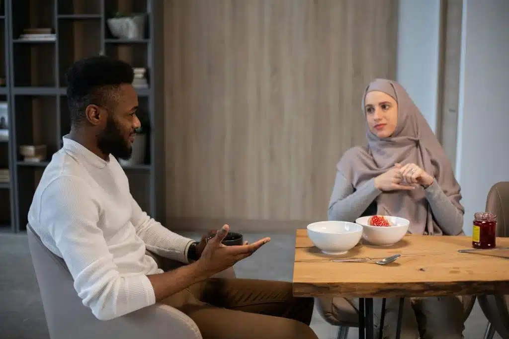 A man and woman talking
