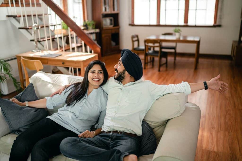 A man and woman at the couch