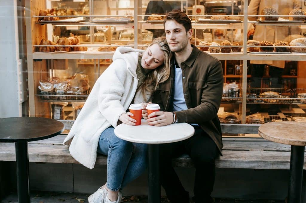 A man and woman having a coffee