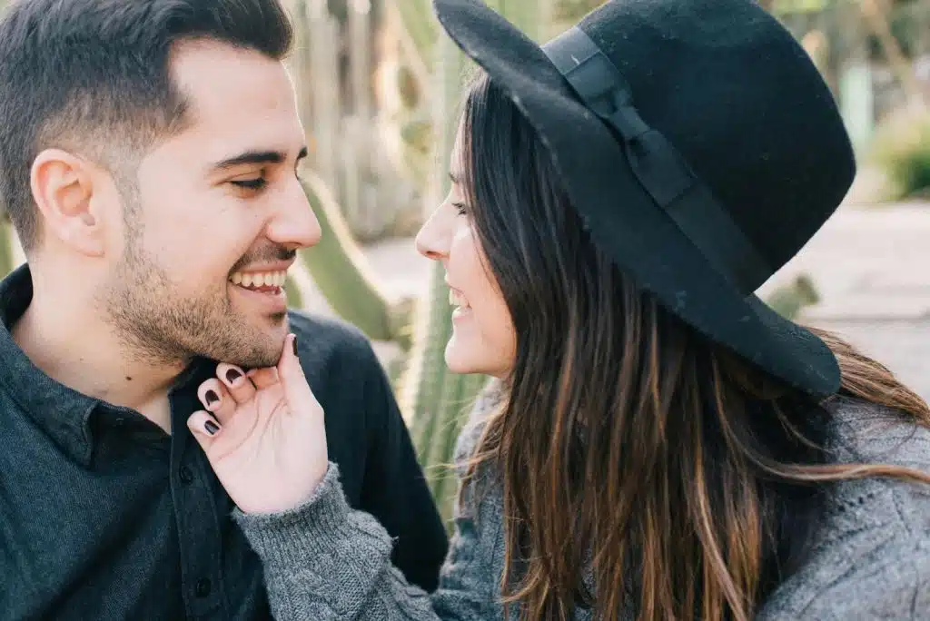 A man and woman looking at each other