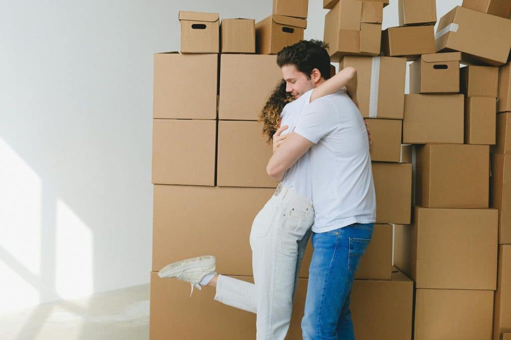 A man and woman hugging