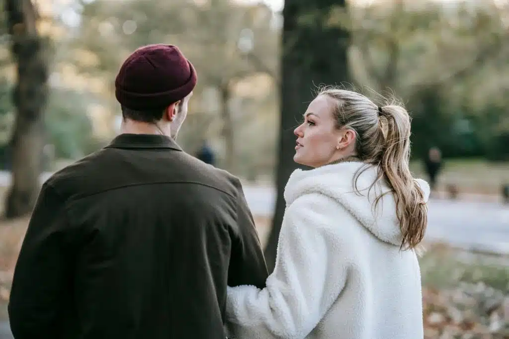 A man listening to a woman while she's talking